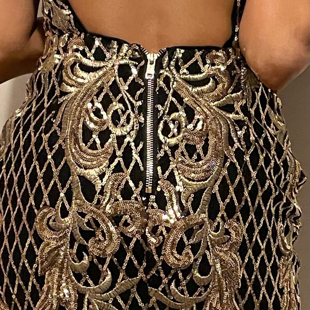 First, Happy New Year 2023!!! This is a fitting dress great for a special event.